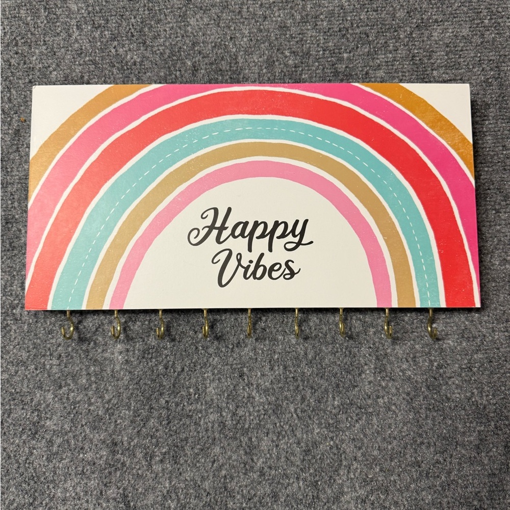 Sign with hooks